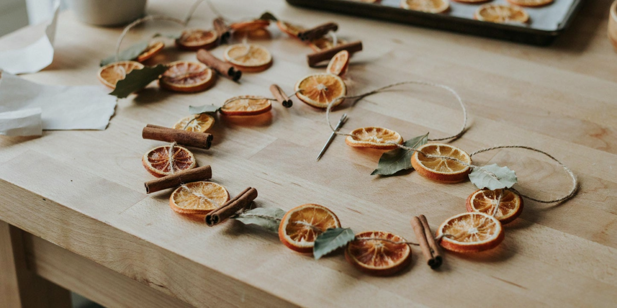 A garland of dried orange slices and cinnamon sticks on twine
