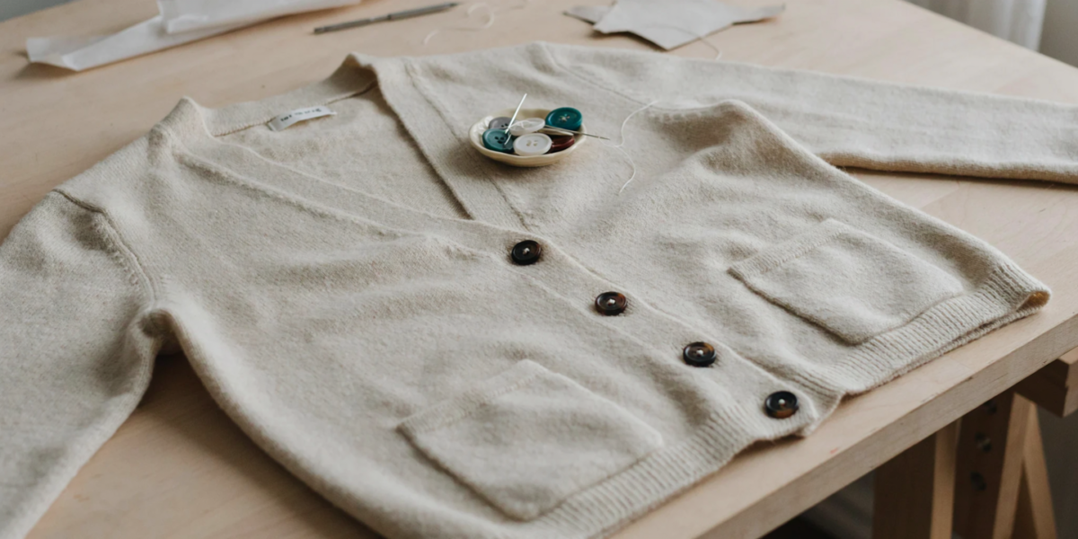 A cardigan with its plastic buttons replaced by wooden ones